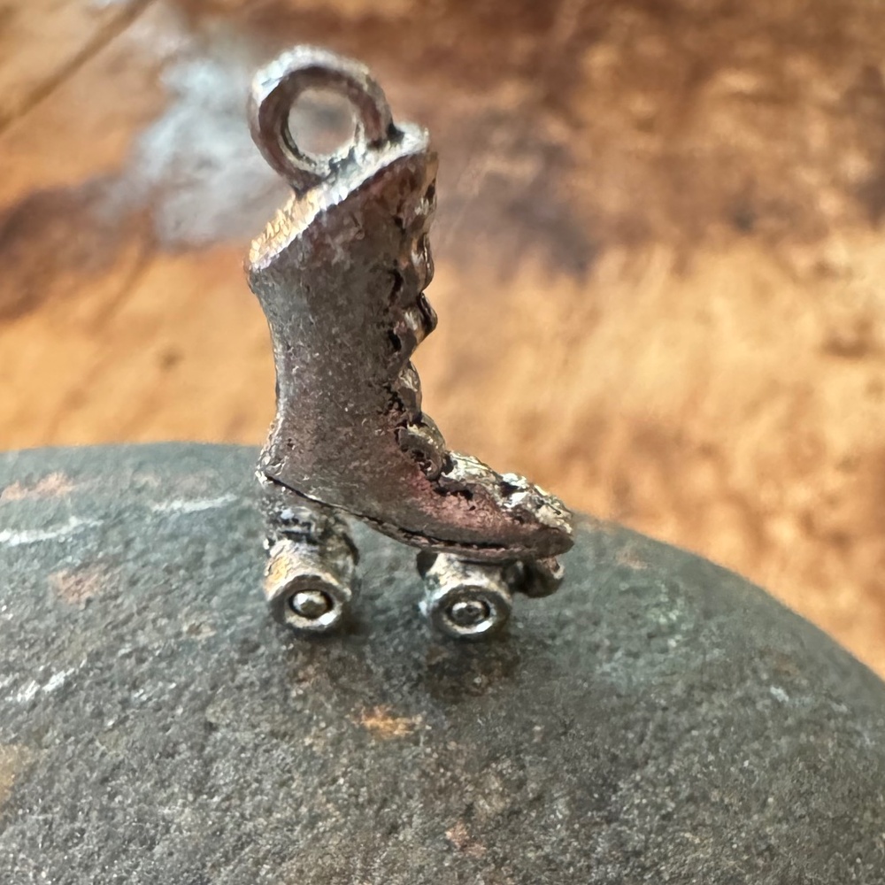 Silver Victorian roller skate charm. Like new!